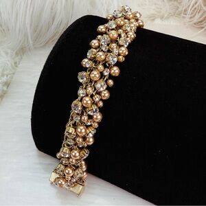 Gorgeous aged goldtone, wide band, clear bling, magnetic closure bracelet